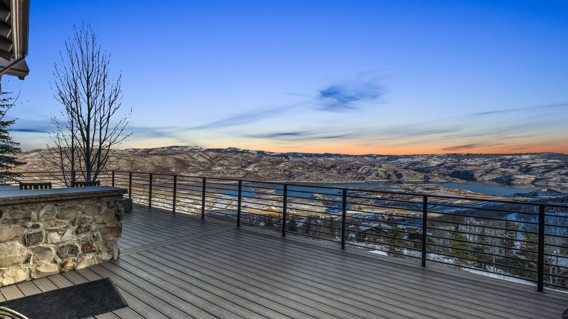 The patio of this luxury Park City vacation rental, overlooking the lake.