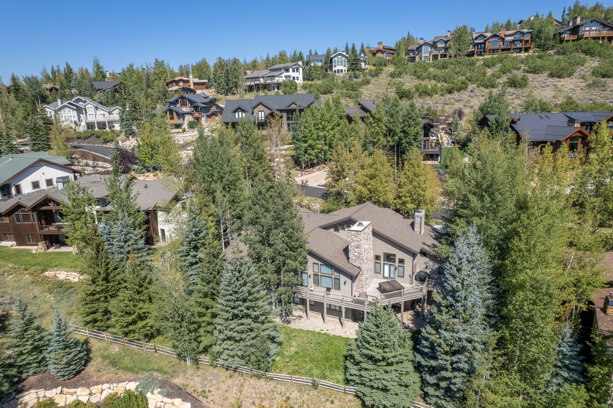 Aerial View of The Private and Fenced Backyard of One of Our Luxury Park City Vacation Rentals.
