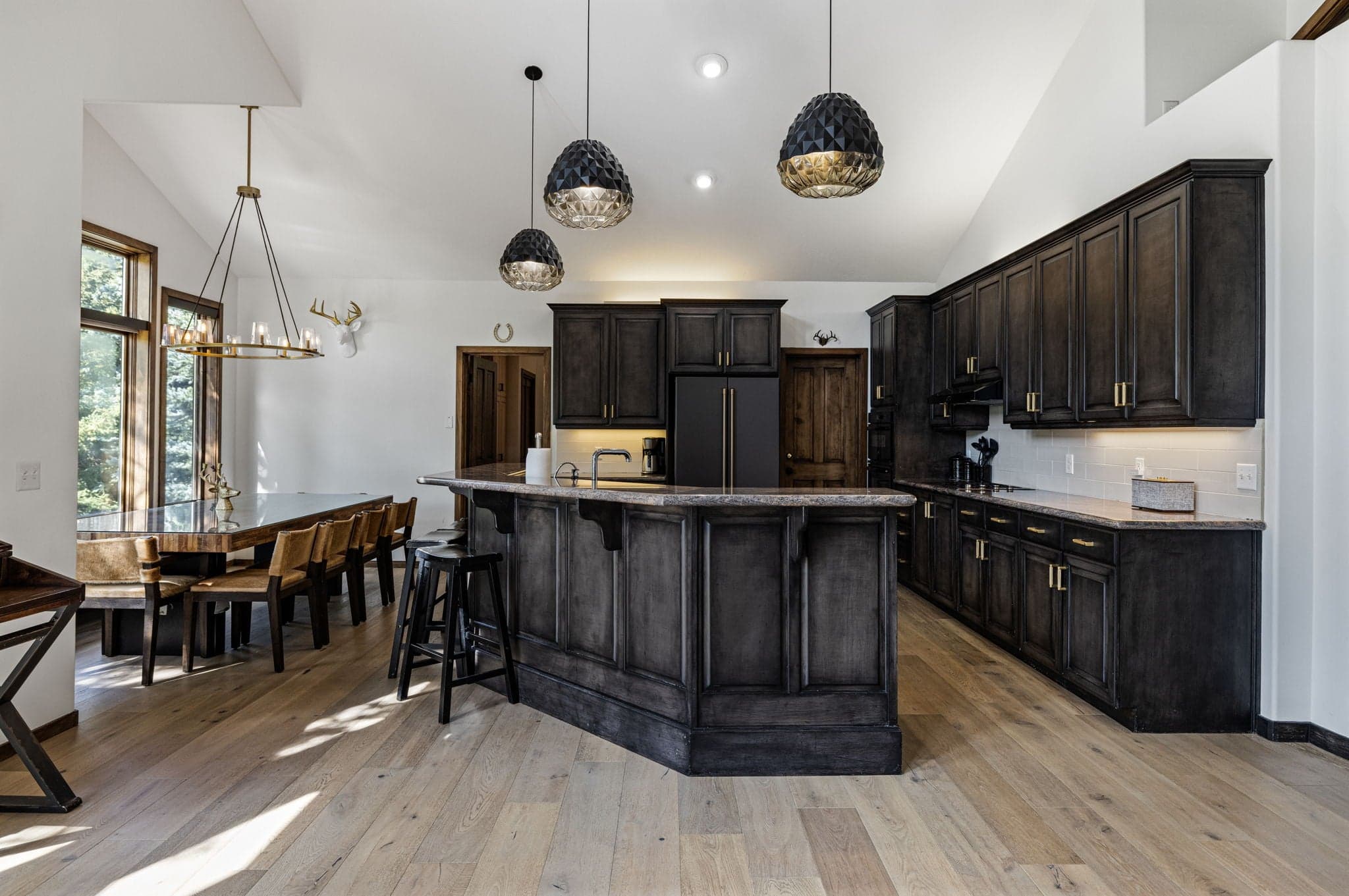 The Kitchen Featuring a Large Dinner Table in Our Deer Valley Vacation Home Rental.