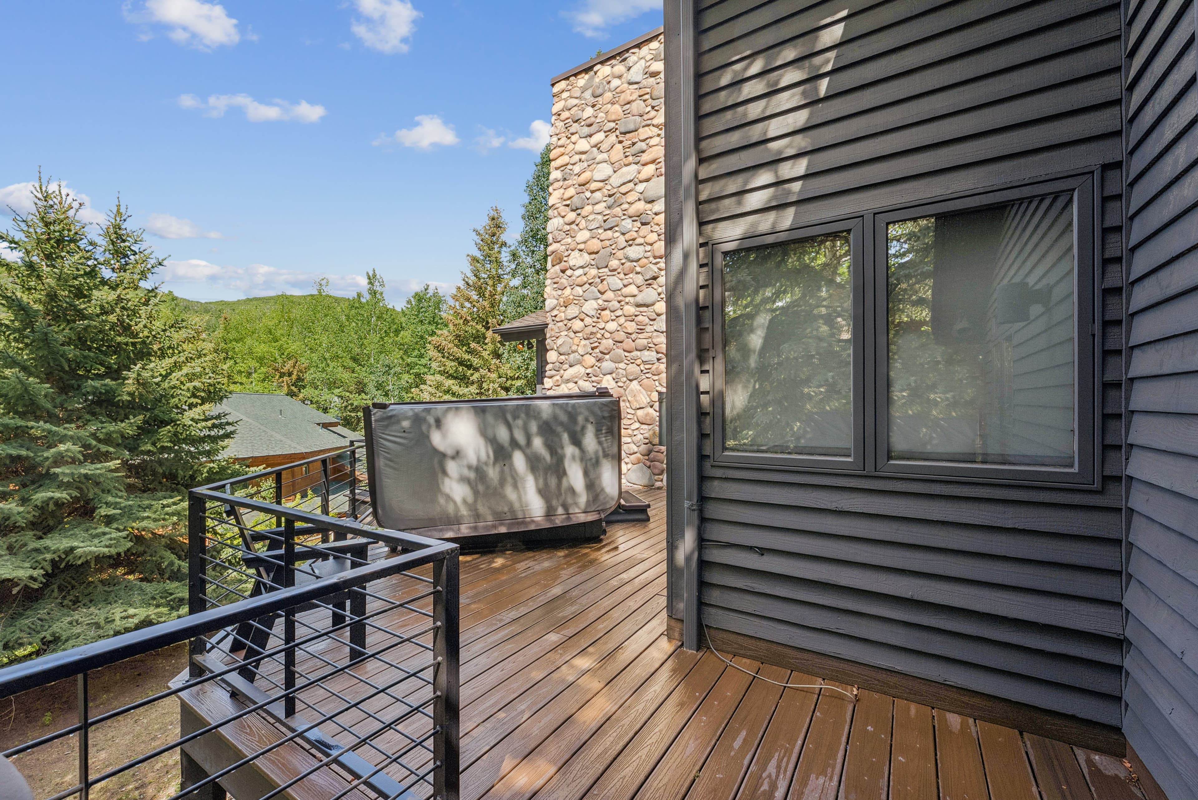 deck views with hot tub